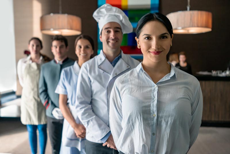 Hotel Hospitality Team standing in a line