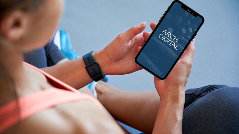 Woman Looking over Arch Digital Amenities App